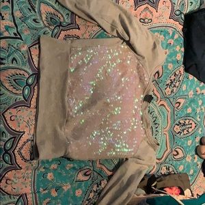 Cute long sleeve over the shoulder sparkly shirt